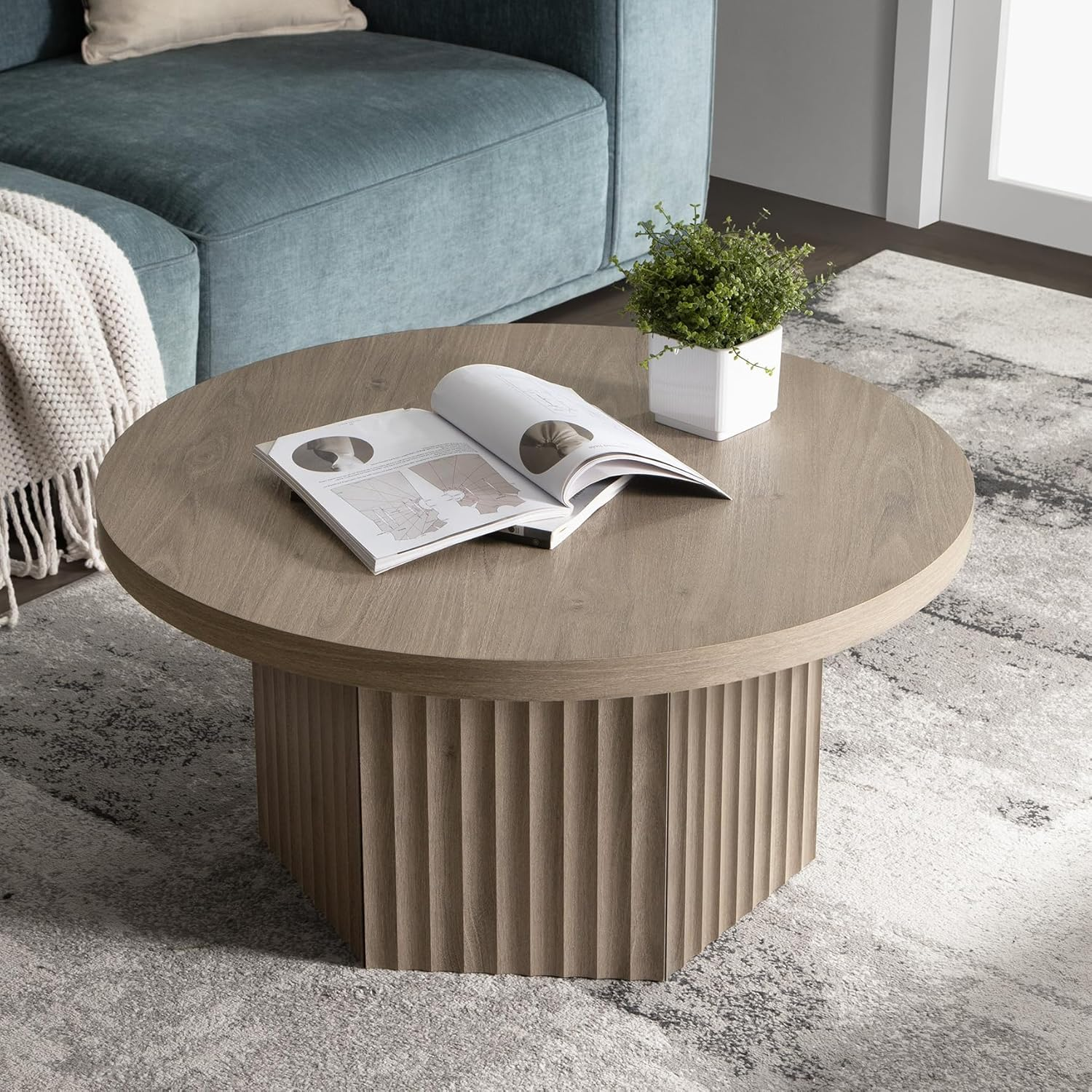 How to Pick a Coffee Table (Size, Shape, and Layout Rules)