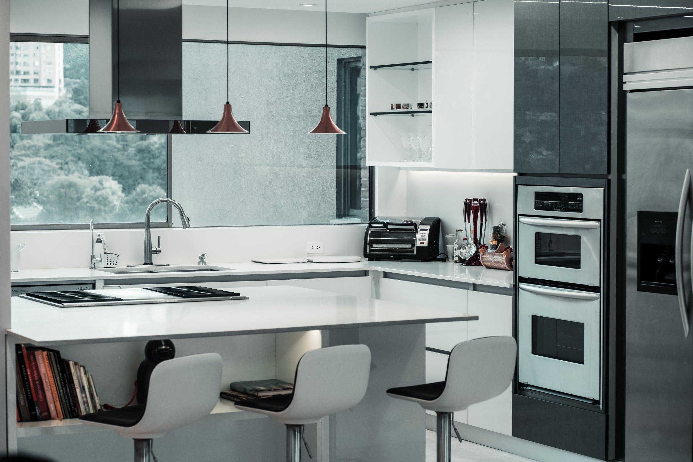 Modern White-Blackish Dining Room Theme:Kitchen Island with Storage,3Pieces Swivel Bar Stools with White Low Soft Pack, adjustable Height Stool,Silver Chandelier