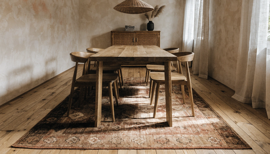How to Choose the Perfect Rug for Your Dining Room (Size, Shape, and Placement Under the Table)