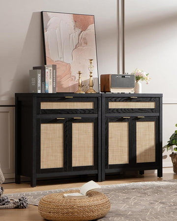 Modern black buffet cabinet with cane doors, decorative books, art, and radio in a stylish living room