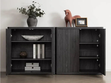Modern dark wood cabinet with shelves, books, decor, and a vase on top