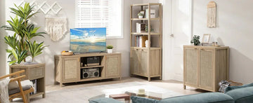 Modern living room with rattan furniture, TV stand, bookshelf, plants, and natural decor