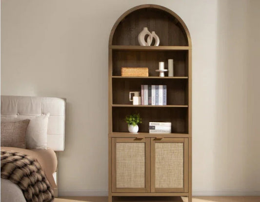 Modern arched wooden bookshelf with decor, books, and cabinet in cozy bedroom setting