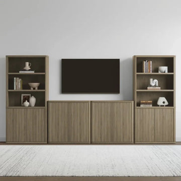 Modern living room with wood media console, open shelves, and wall-mounted TV