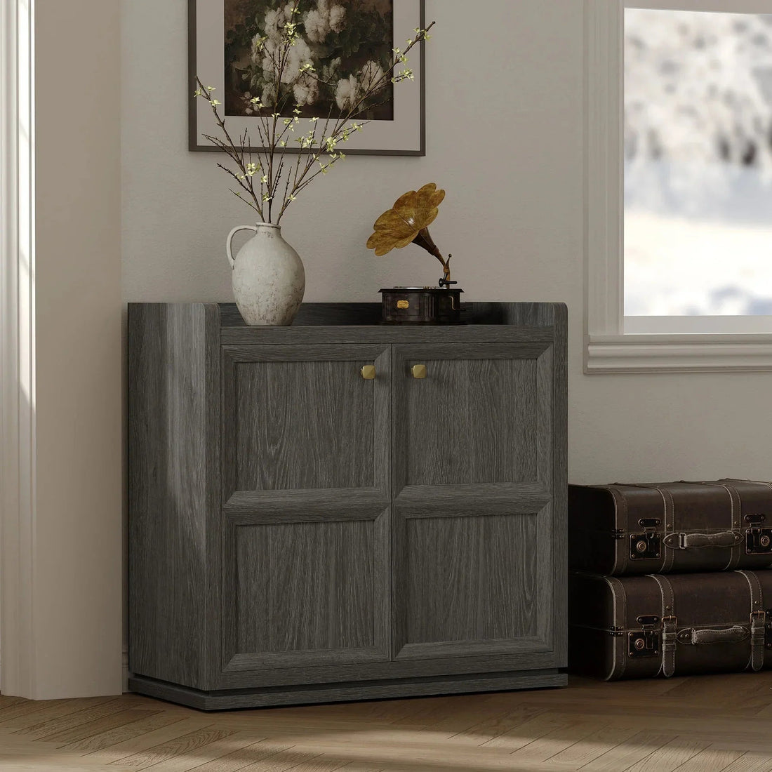 Modern dark wood sideboard with decor, vintage gramophone, and vase in a cozy living room