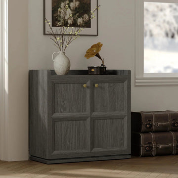 Modern dark wood sideboard with decor, vintage gramophone, and vase in a cozy living room