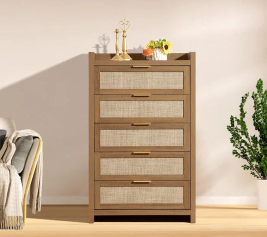 Modern brown wood dresser with five drawers, brass handles, and sunflowers on top