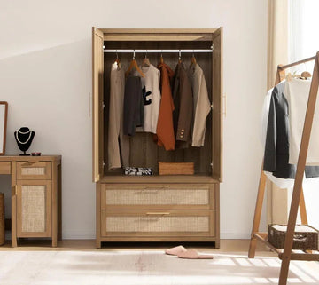 Modern wooden wardrobe with hanging clothes, drawers, and natural rattan accents in a bright bedroom