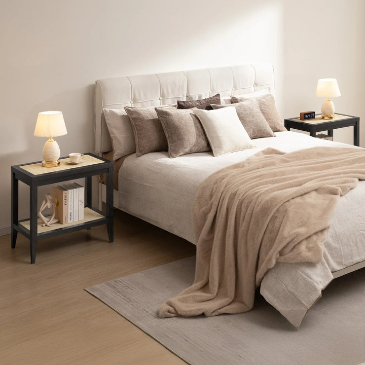 Modern bedroom with beige bedding, plush throw, nightstands, and decorative lamps