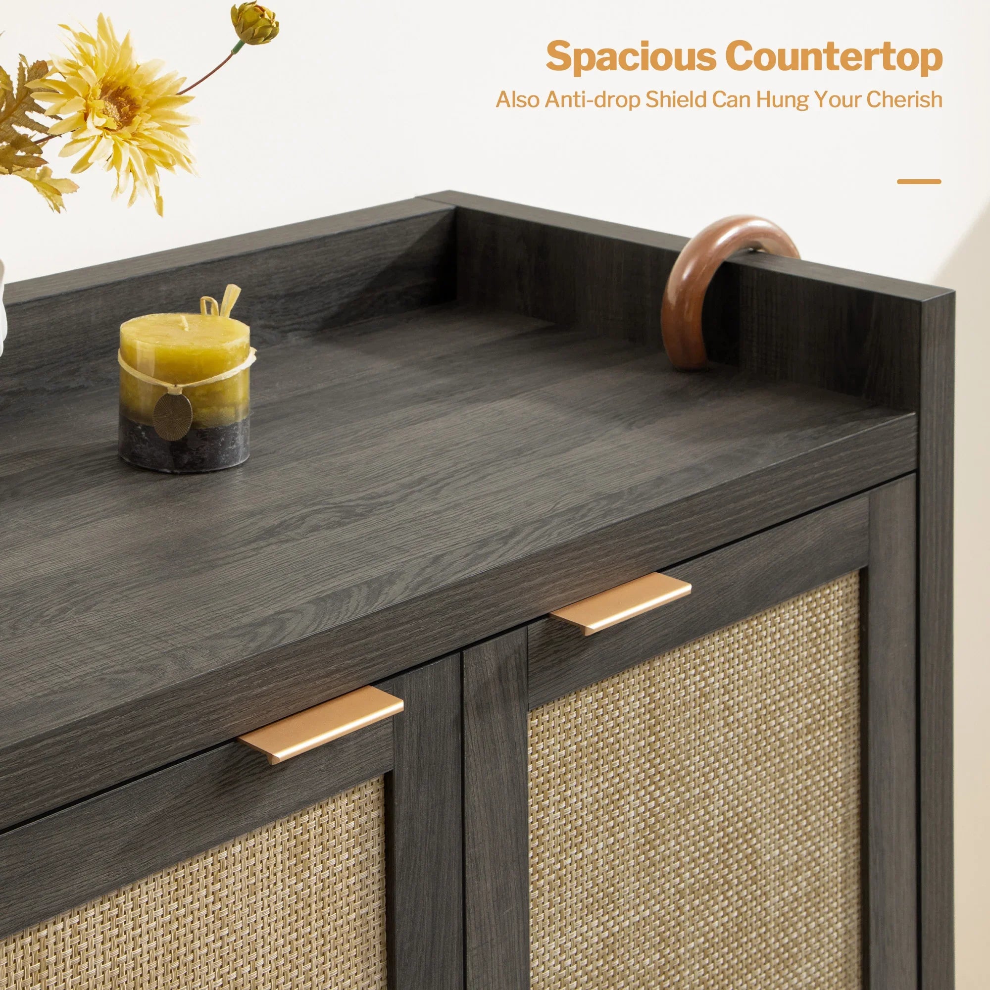 Dark wood cabinet with spacious countertop, yellow candle, and woven door panels