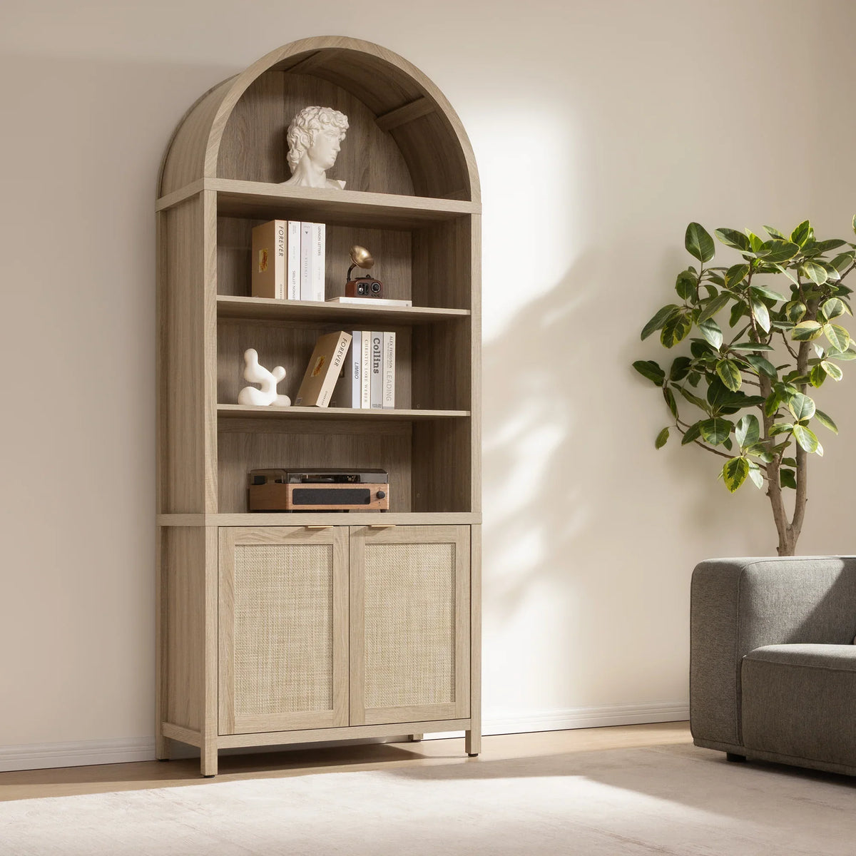 Modern wooden bookcase with arch, books, decor, and stereo in minimalist living room
