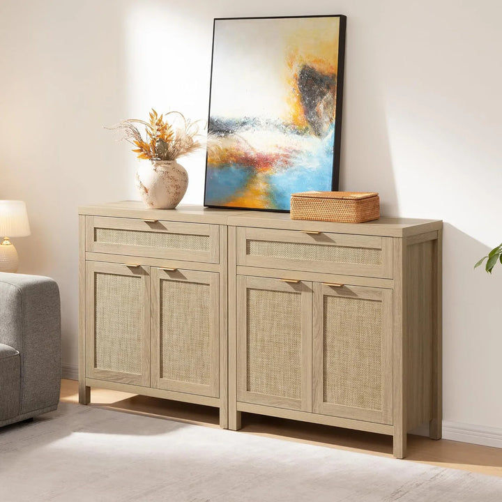 Light wood sideboard with wicker panels, abstract painting, vase and basket in modern living room