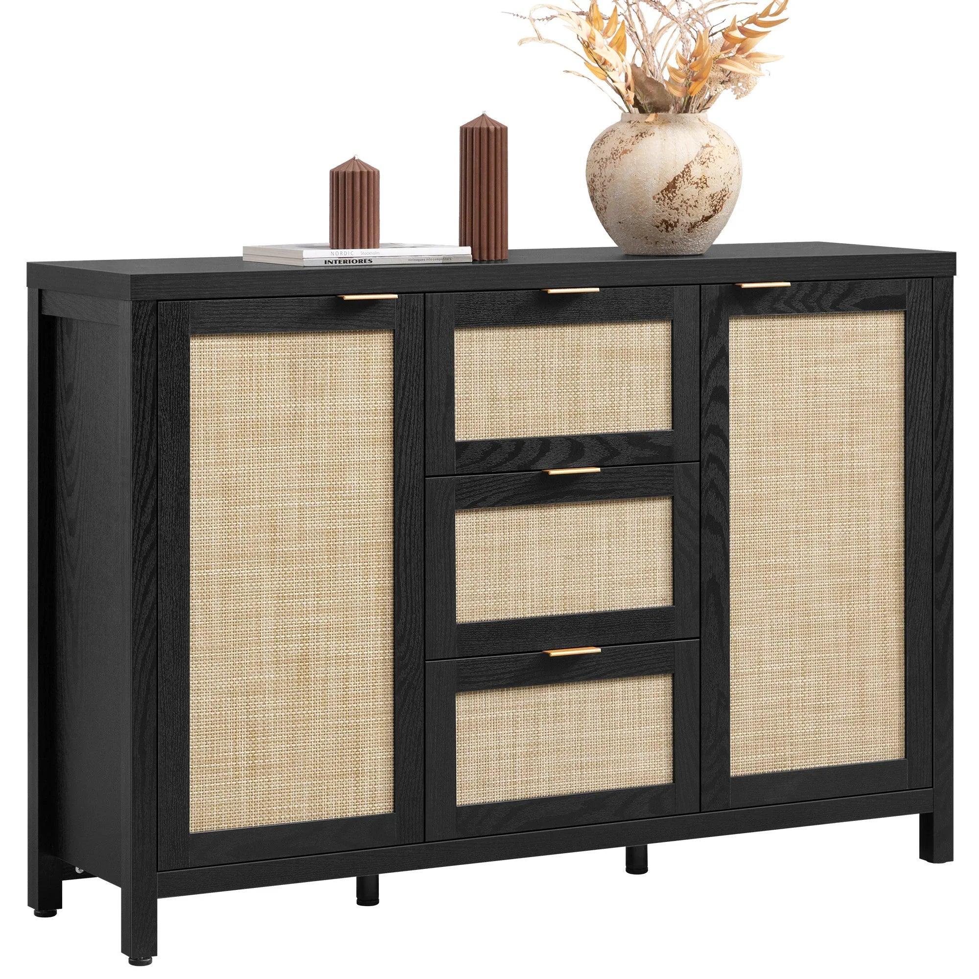 Modern black sideboard with rattan doors, three drawers, decor vase and candles on top