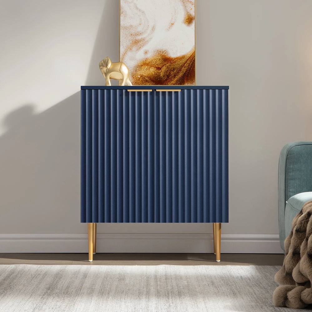 Modern blue cabinet with gold legs and handles, gold elephant decor, abstract art background