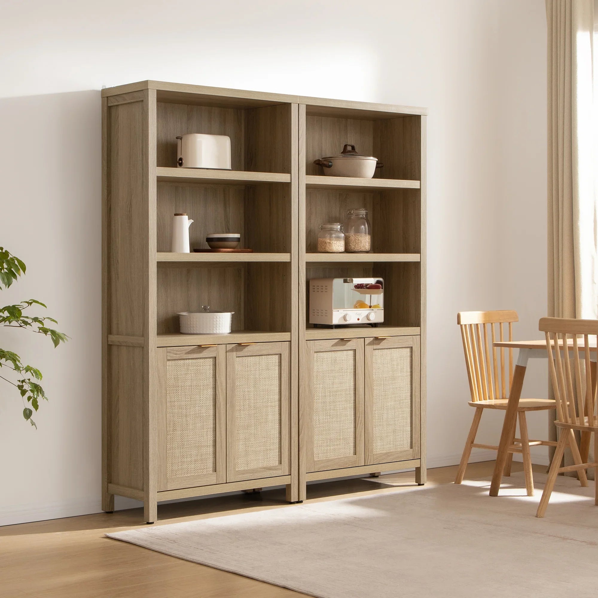 Light wood kitchen cabinet with woven doors, open shelves, and dining set in bright room