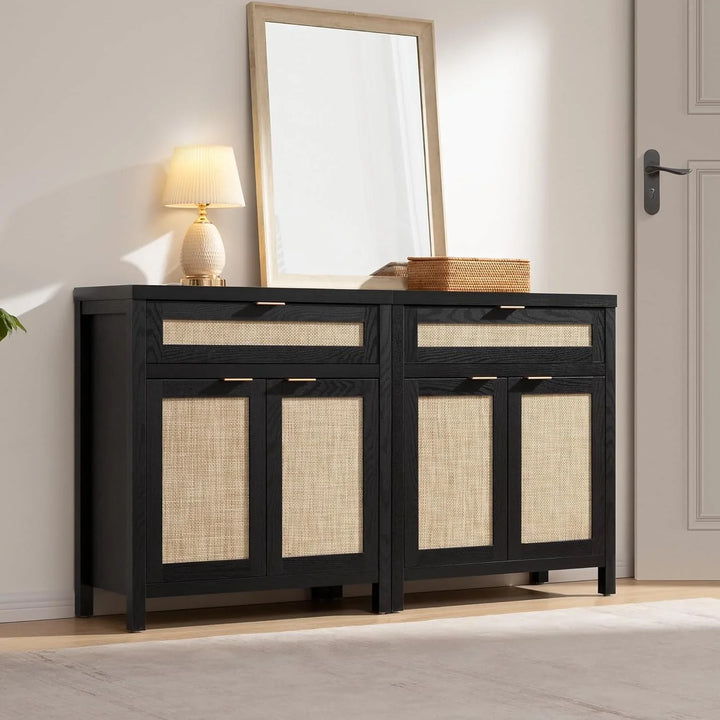 Modern black and rattan sideboard with drawers, table lamp, mirror, and woven basket
