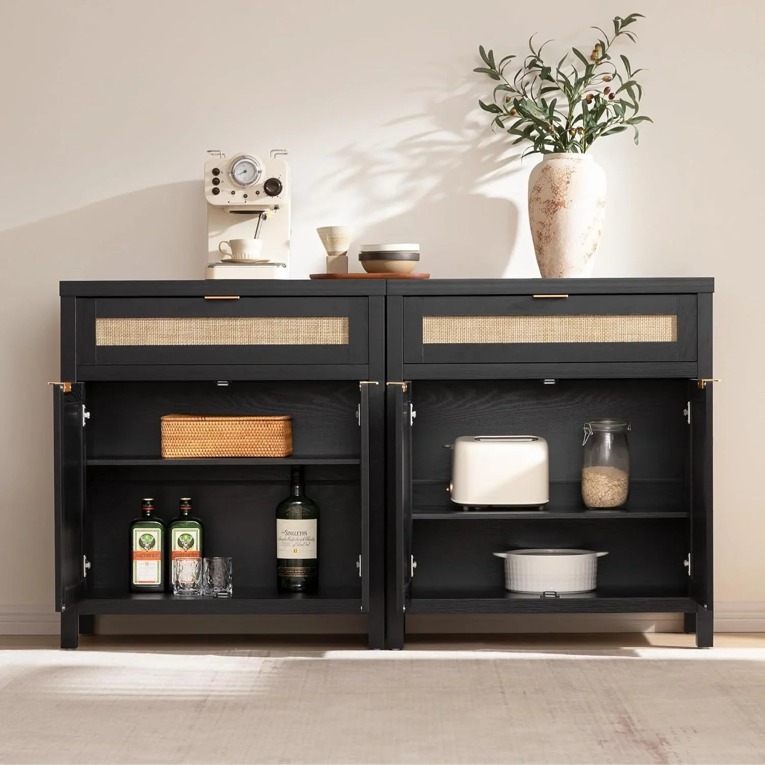 Modern black sideboard with rattan drawers, coffee machine, and decorative vase