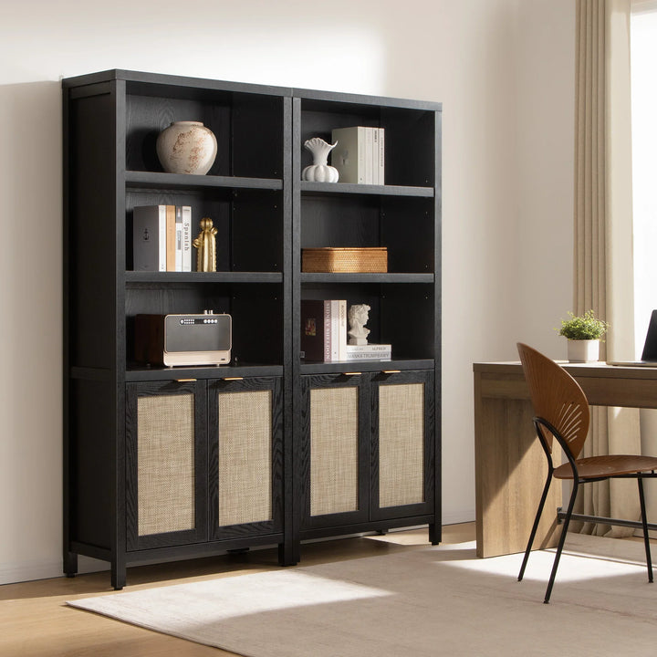 Modern black bookshelf with rattan doors and decor in a bright home office