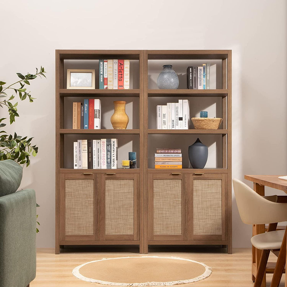 Modern wooden bookshelf in living room, decorated with books, vases, and storage baskets