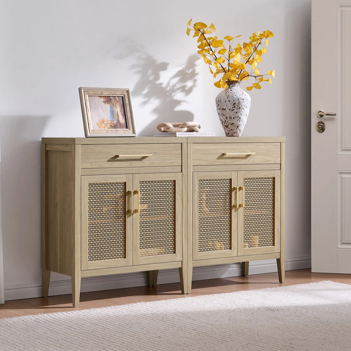 Modern oak sideboard with rattan doors, art frame, ceramic vase and yellow flowers