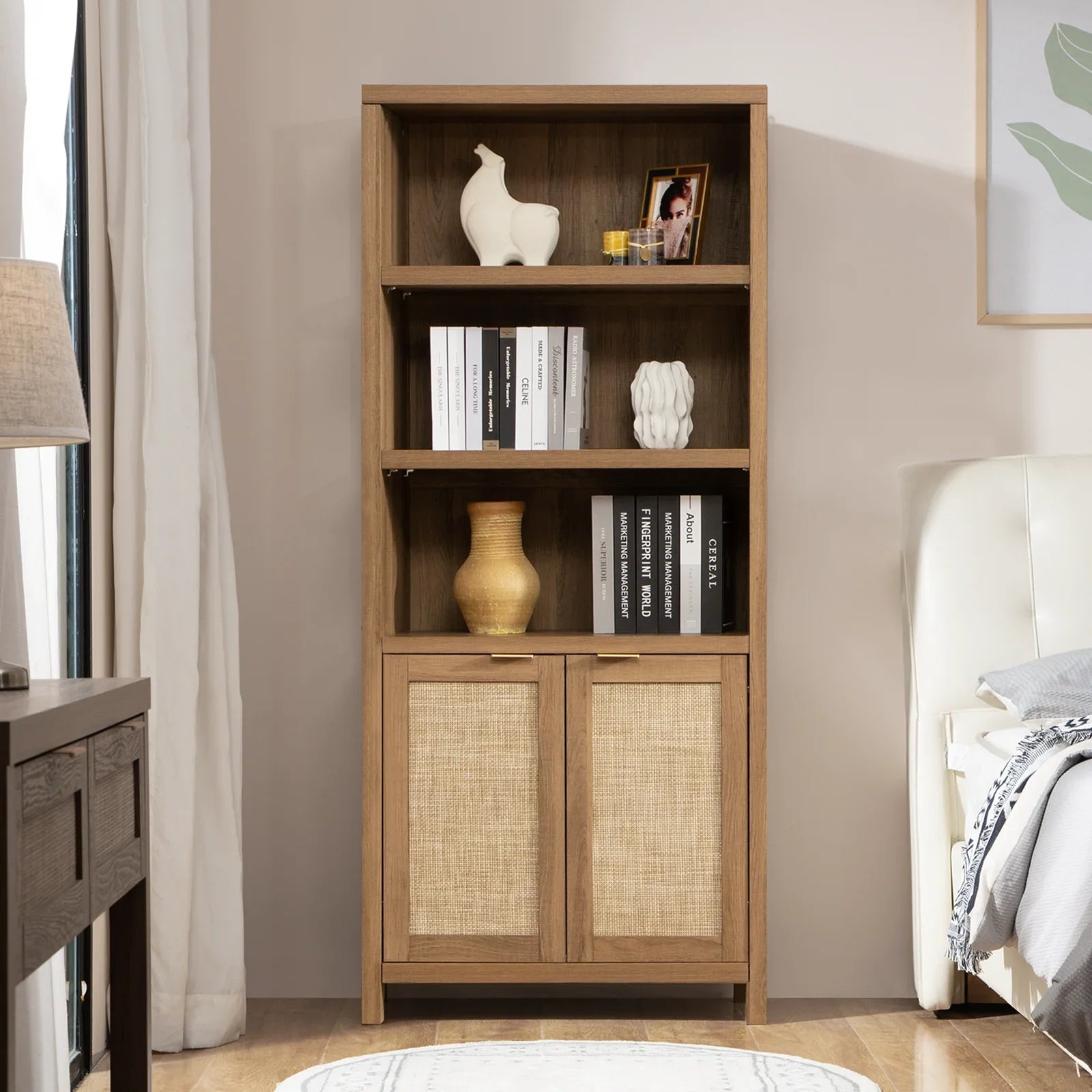 Modern wooden bookshelf with books, vases, framed photo, and decor in bedroom corner