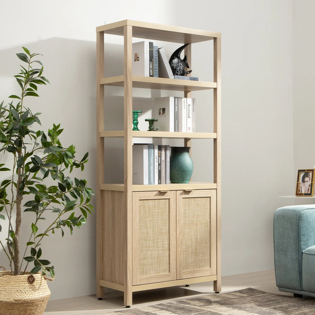 Modern wooden bookshelf with decorative items, books, and woven cabinet doors in a living room