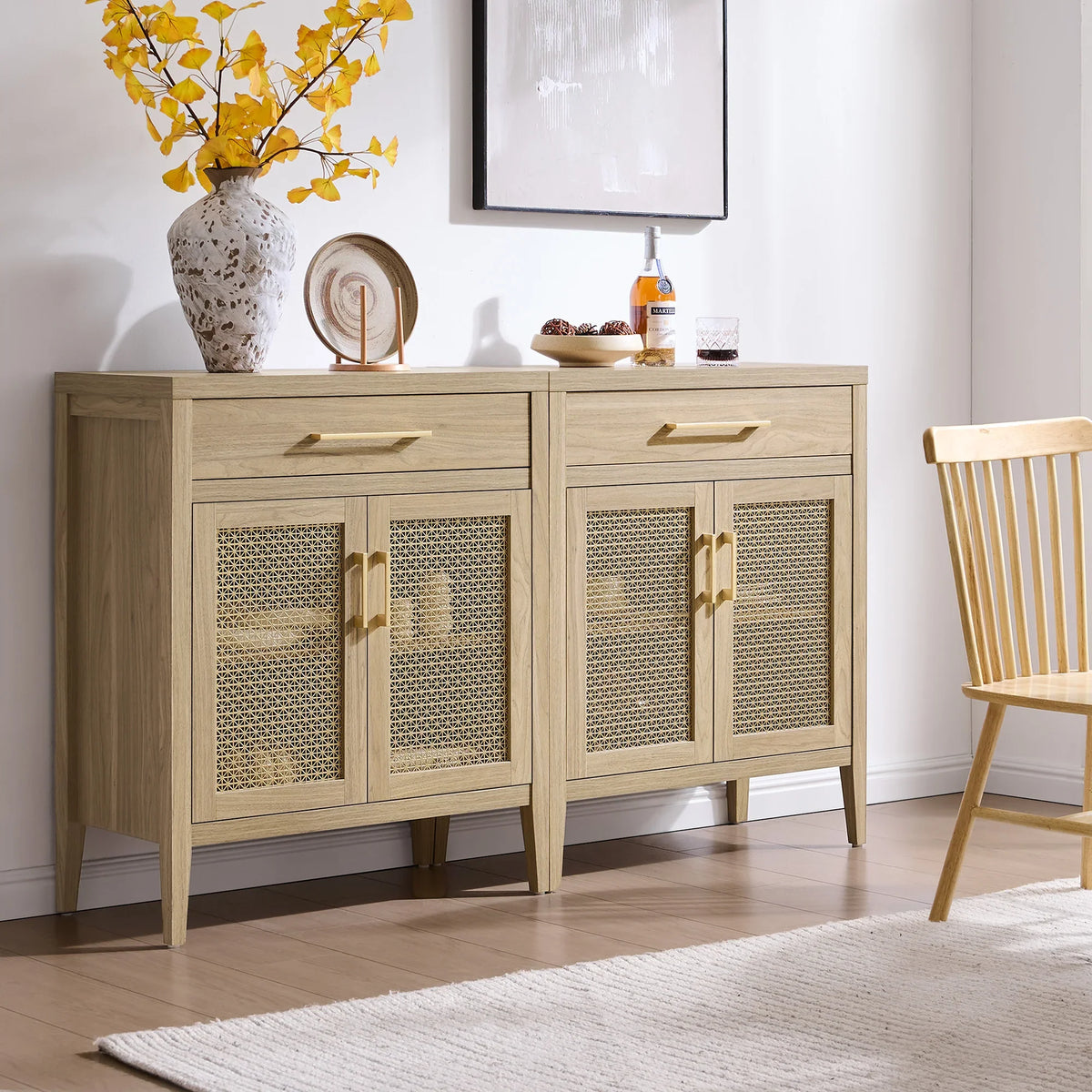 Modern oak sideboard with rattan doors, autumn vase, and decor in bright living room