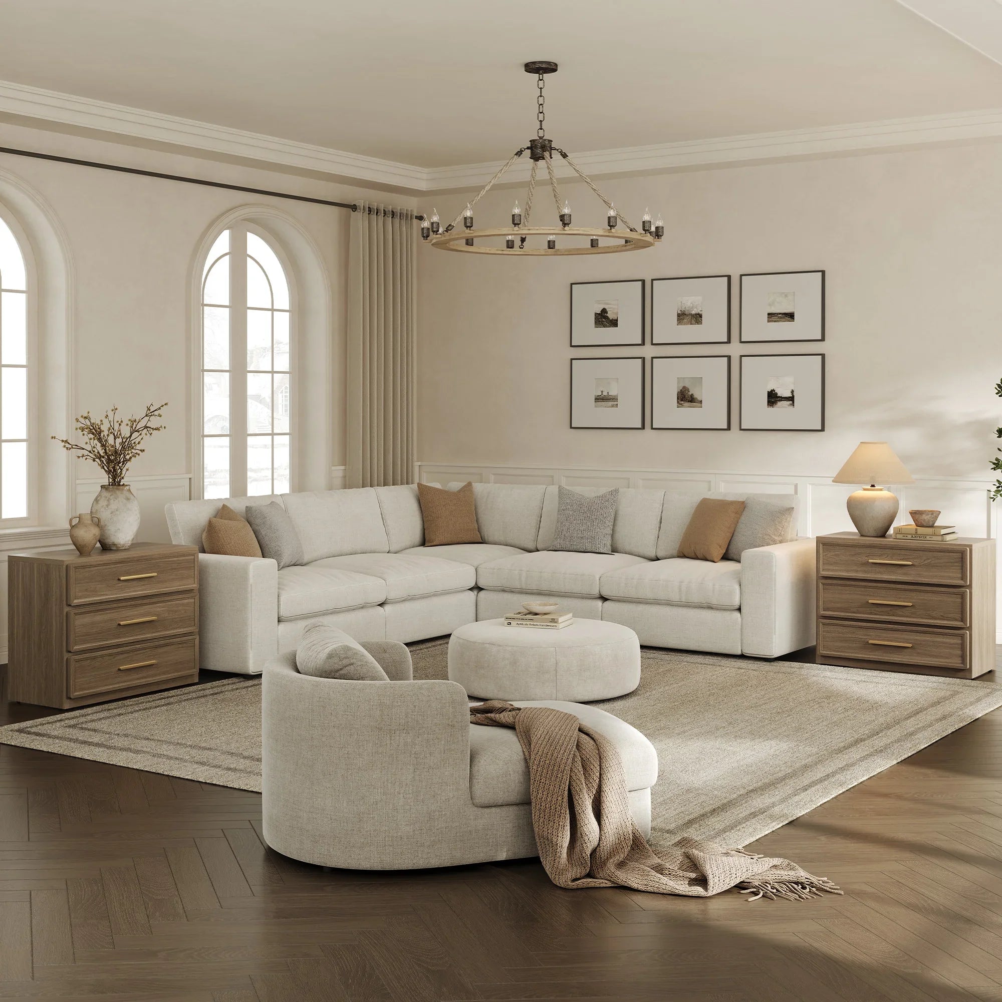 Modern living room with cream sectional sofa, round chair, wood side tables, and neutral decor