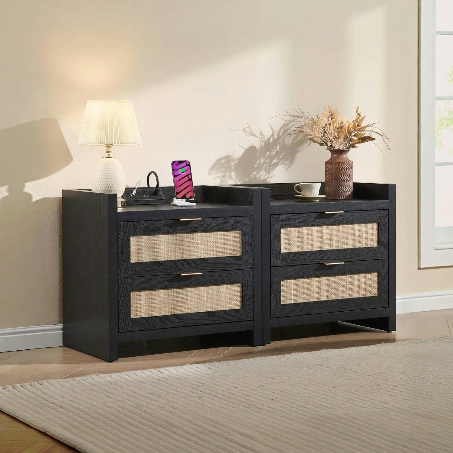 Modern black nightstands with rattan drawers, lamp, vase, and decor in bright bedroom