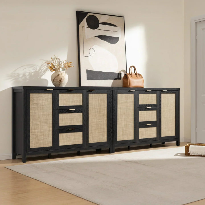 Modern entryway with black wood and rattan sideboard, abstract art, vase, and brown bag
