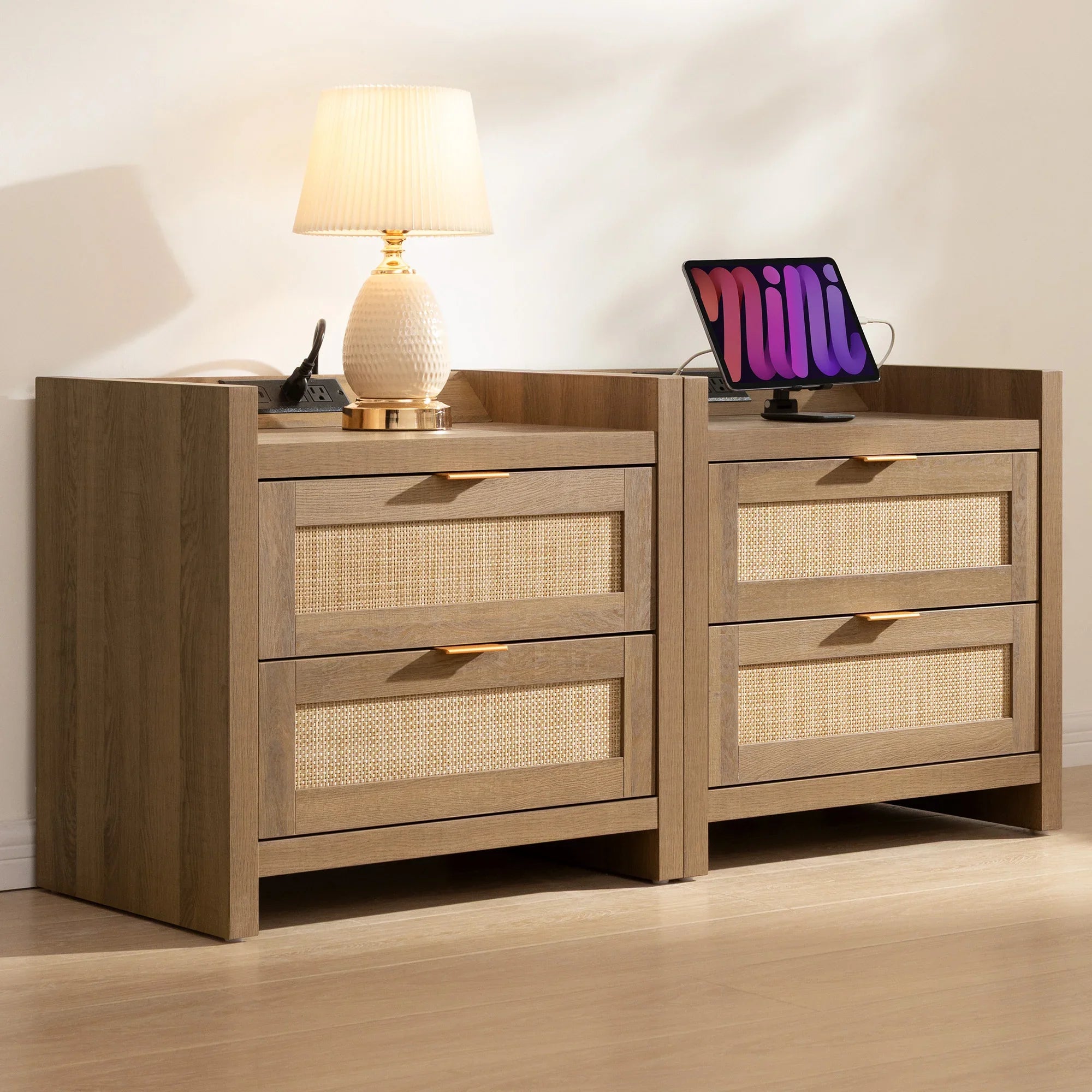 Modern wooden nightstands with rattan drawers, table lamp, and digital tablet display.