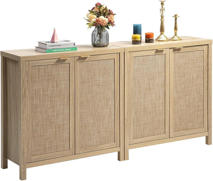 Modern light wood sideboard cabinet with rattan doors, books, flowers, candles, and brass candlesticks