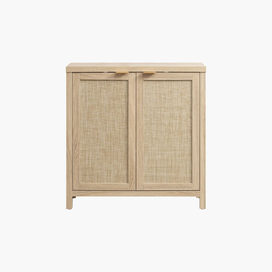 Light wood cabinet with two woven rattan doors, modern minimalist furniture on white background.