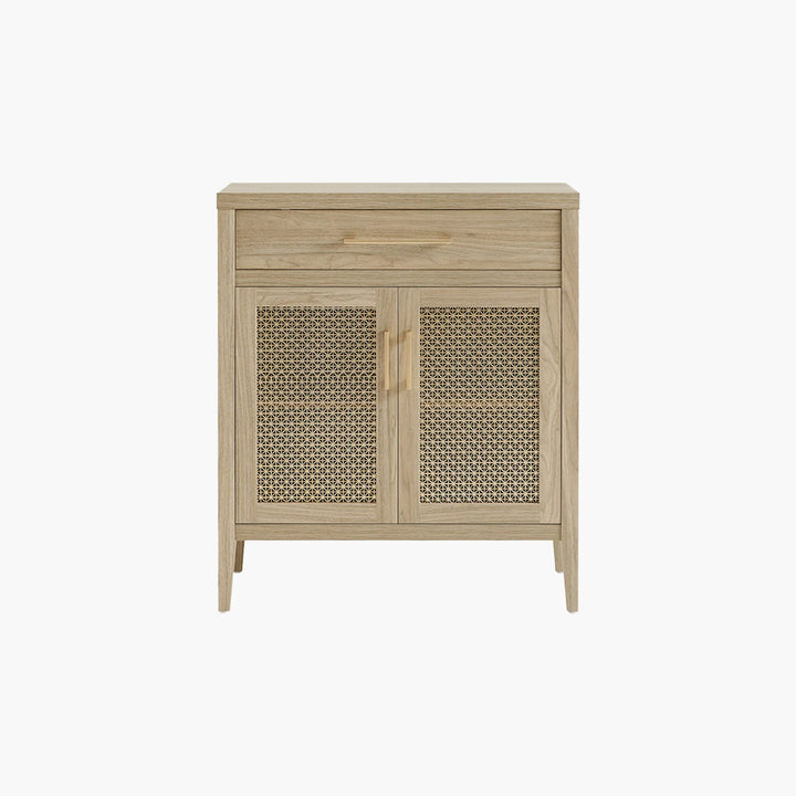 Light wood accent cabinet with cane doors and gold handles on white background