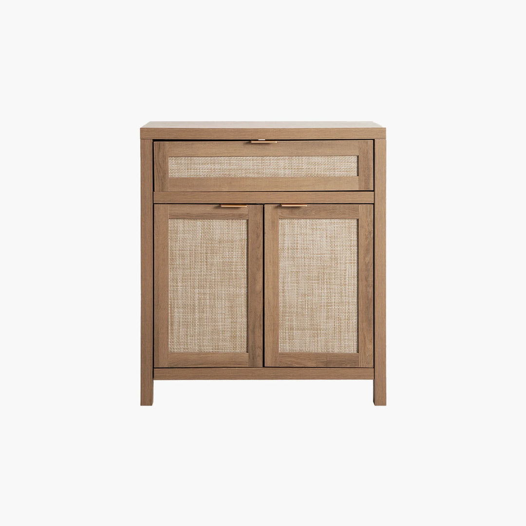 Modern wood accent cabinet with woven cane doors and drawer on white background