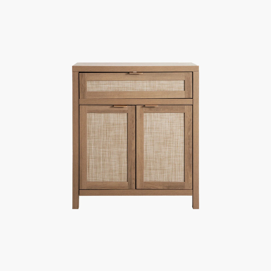 Modern wood accent cabinet with woven cane doors and drawer on white background