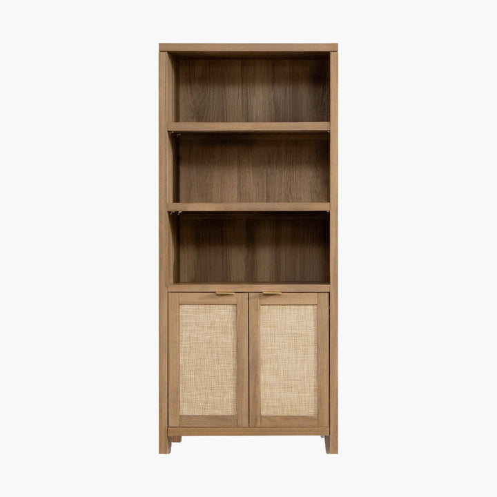 Wooden bookshelf with two open shelves and rattan cabinet doors on white background